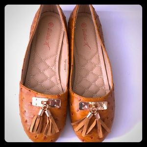 Woman’s pho ostrich dress shoe
